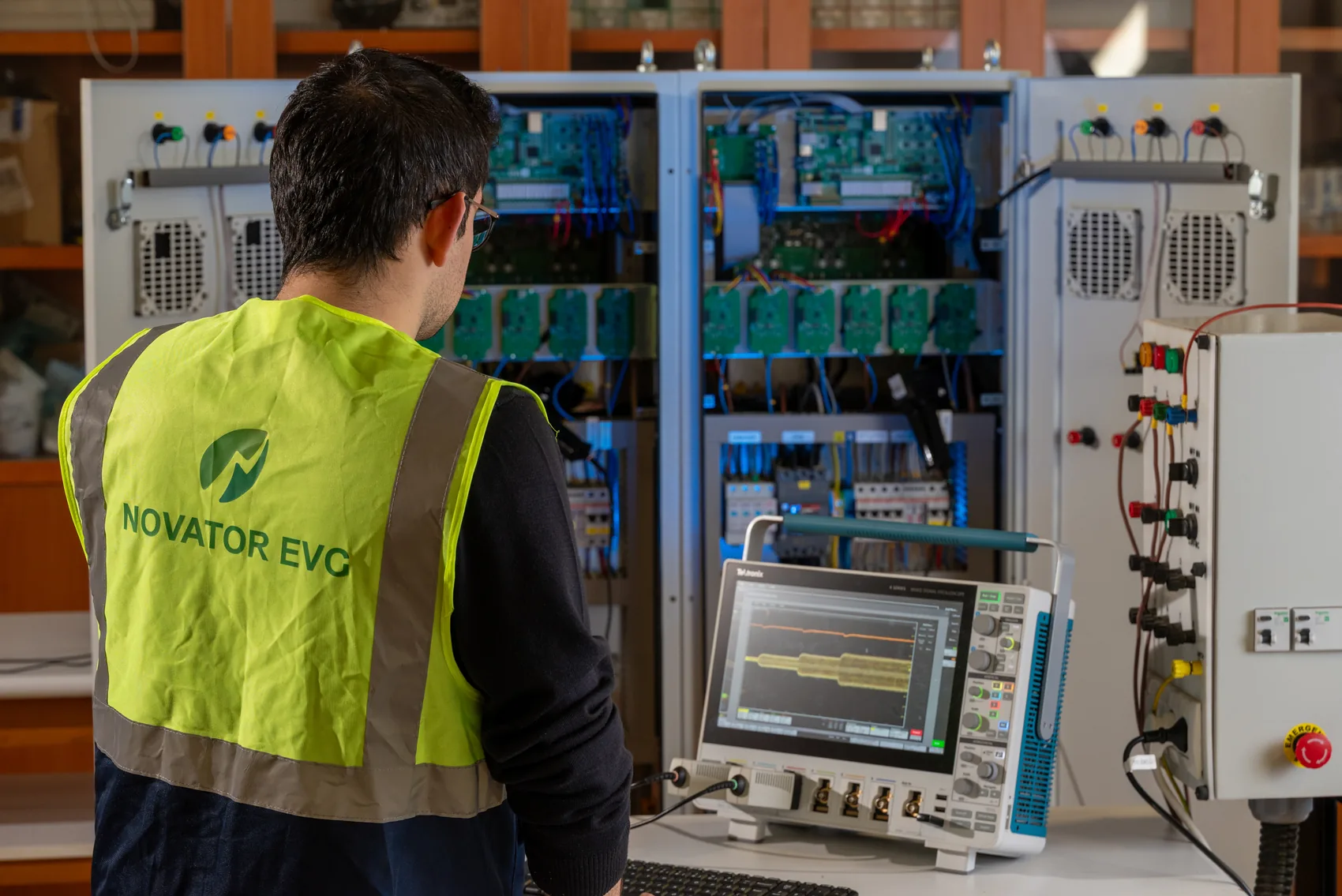 Engineer working on power electronics hardware