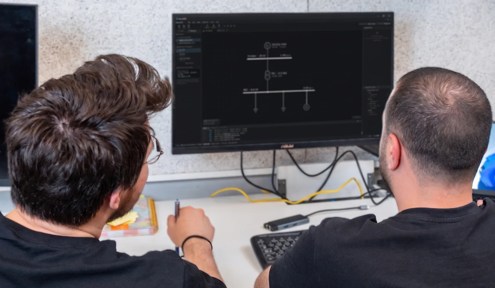 Energy analytics software displayed on monitors